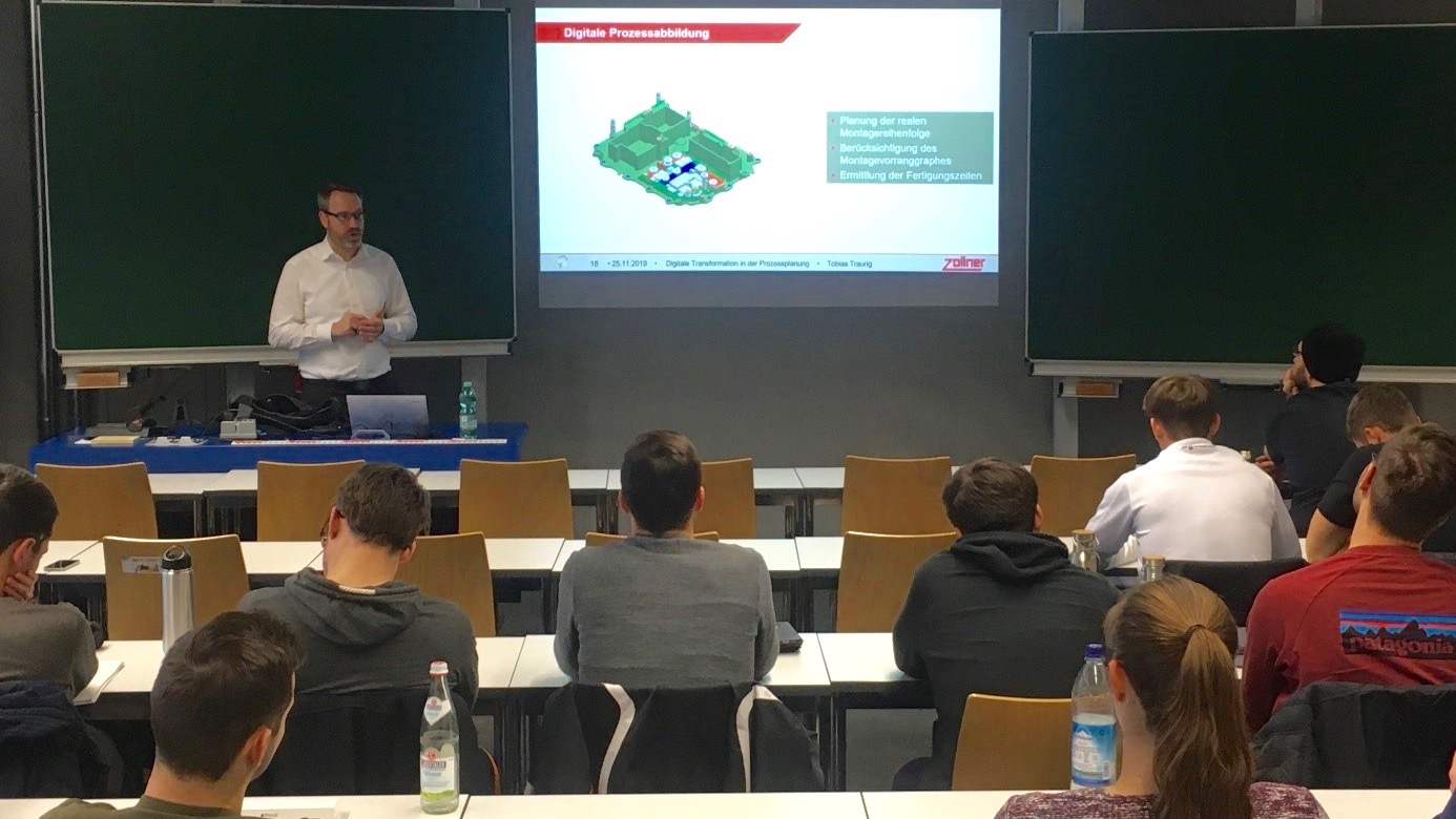 In einem Gastvortrag an der OTH Regensburg erläuterte Tobias Traurig die Herausforderungen der digitalen Transformation in der Prozessplanung bei einem EMS-Dienstleister. 